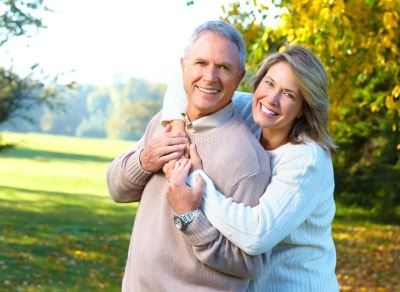 Elderly Couple Hugging